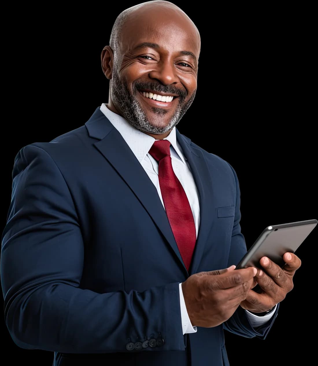 A professional in a suit reviewing information on a tablet
